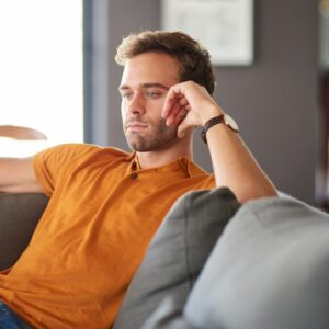 A guy thinking about his girlfriend being pregnant